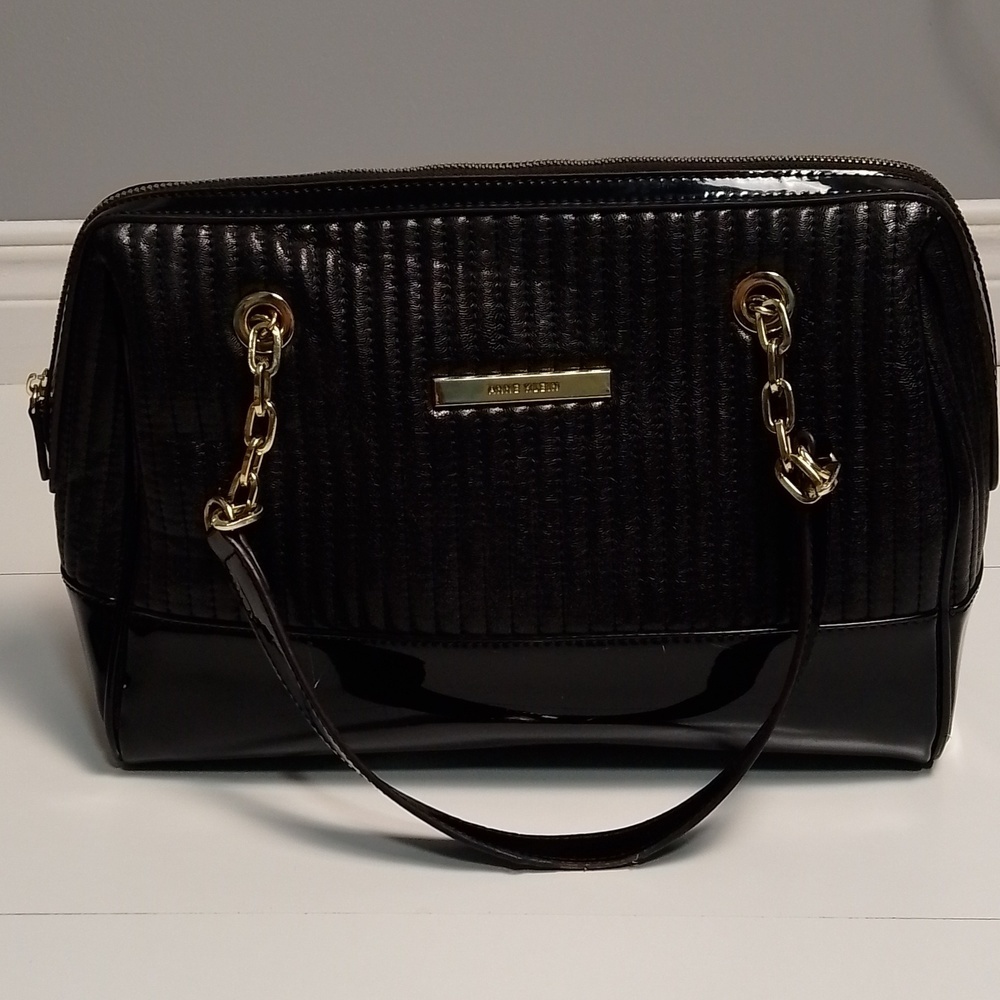 Anne Klein  black and gold purse shoulder bag . Polka dot interior.